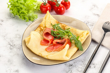 Russian pancake with salmon fish