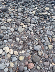 Top view of floor with round basalt rocks