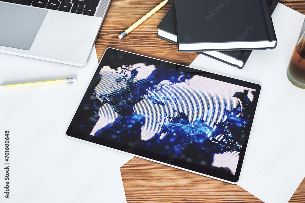 Poster abstract creative world map on modern digital tablet monitor, tourism and traveling concept. top vie