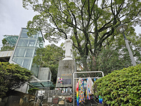 NAGASAKI, JAPAN - NOVEMBER 16, 2023: Sadako Sasaki statue at Nagasaki hypocenter park. She is a bomb affected person in Hiroshima on August 6, 1945.