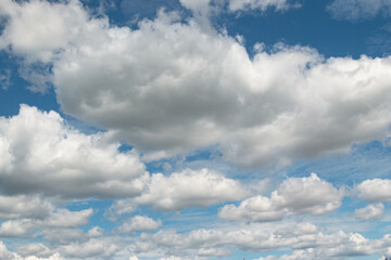 white clouds on blue sky background.
