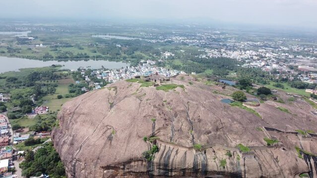 Establishing drone shot of historic Dindigul Rock Fort, Tamil Nadu, India