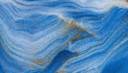 Closeup dust of pigment sparkling with blue fluid color