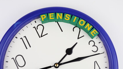 Single word "PENSIONE" on wooden block, taxes isolated, with clock background.