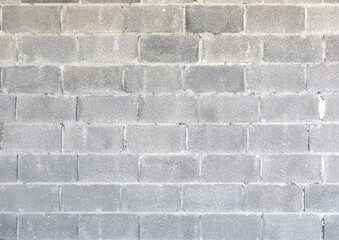 Concrete wall with cement block and plaster at construction site
