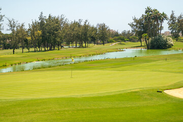 Obraz premium Best Time to Visit golf course for a Golf Holiday sunny day