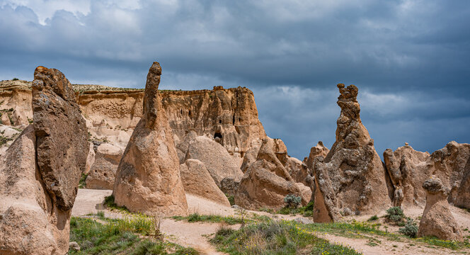 Rock formations in the form of bizarre forms created by nature in the Devrent Valley, Cappadocia
