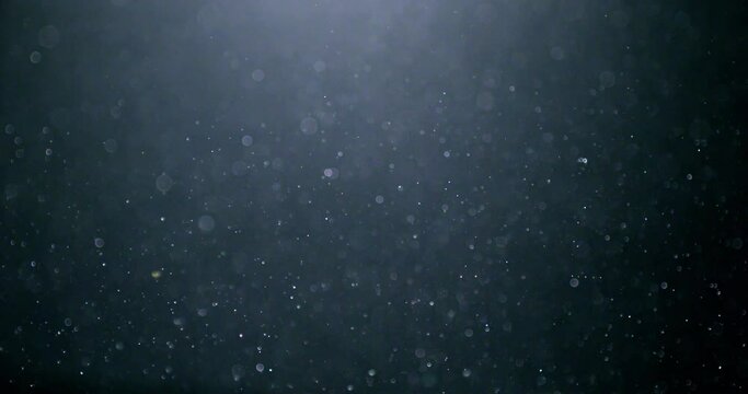 3D rendering bubble spheres randomly floating in the water for composite. Close up and slow-motion movement.