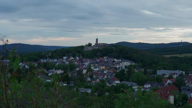 A ruined castle on a hill with a village in the foreground (K&ouml;nigstein im Taunus)
