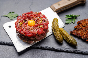 Savory beef tartare and brown bread toasts