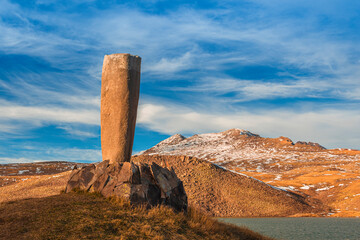 A vishapakar (Armenian: Վիշապաքար, also known as vishap stone, vishap stelae, serpent-stone, dragon stone) on the Aragats mount in Armenia