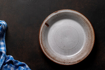 Mockup for a delicious meal. Empty plate on a table