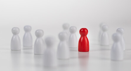 Leadership concept, wood person red color Stand out from the crowd and different creative idea and...