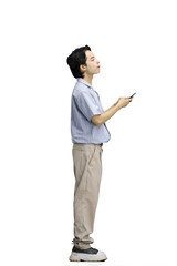 A guy in a blue shirt, on a white background, full-length, with a phone