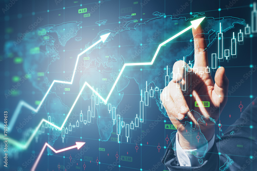 Poster close up of man hand pointing at growing upward chart, map, arrows and forex graph on blurry backgro