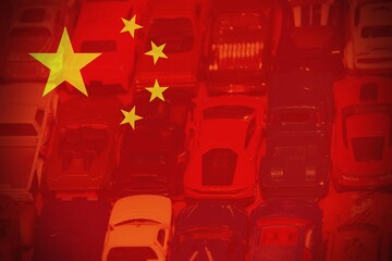 Chinese flag with different cars as background.