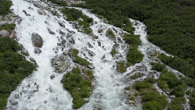 Aerial view of Rhone river's waterfall near Glacier in Switzerland