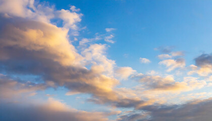 Naklejka na ściany i meble Blue sky background with clouds at sunset