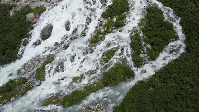 Aerial view of Rhone river's waterfall near Glacier in Switzerland