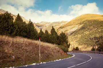 Sharp turn. Driving on a winding mountain road in the Pyrenees, Andorra, Europe. - obrazy, fototapety, plakaty