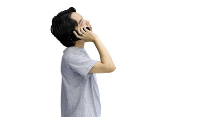 Guy in a gray T-shirt, on a white background, close-up, with a phone