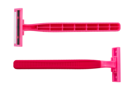 Disposable pink shaving machine on a white background. View from above. Razor isolate