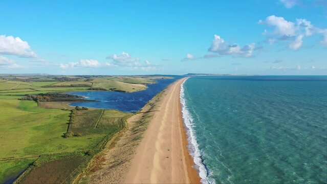 Aerial view of Chesil Beach a 18-mile shingle beach in Dorset, England