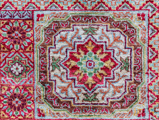Fototapeta premium Pattern of traditional Turkish carpet. Kushadasi, Turkey (Turkiye)