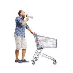 Man shouting into a megaphone and pushing a trolley