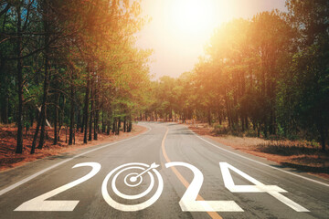 2024 written on the road. New year 2024. Business achievement goal and objective target, challenge,...