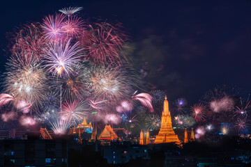 Happy new year 2024. Fireworks celebrate show for prople looking at Wat ArunTemple. Bangkok,...