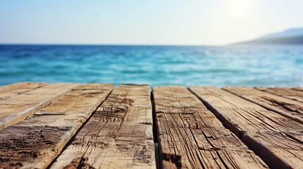 Fototapeten wooden pier on the beach, product display  © daniel