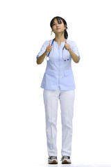 The doctor's girl, on a white background, in full height, shows her thumbs up