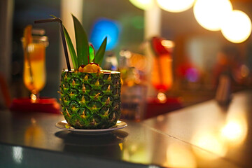 Pina colada cocktail on bar counter