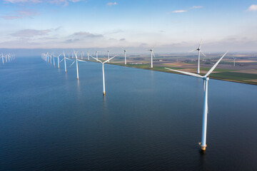 aerial view of wind turbine park at the sea coast