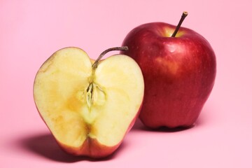 apples on a pink background