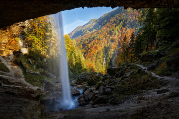 Pericnik Falls, waterfall with orange tree in Triglav National Park, Slovenia. Landscape in  nature...