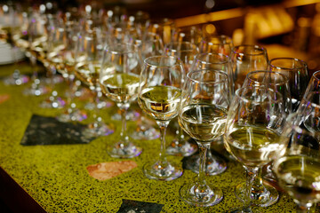 beautiful glasses of wine at an evening festive event