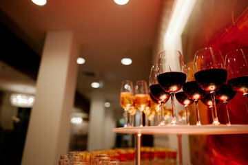 beautiful glasses of wine at an evening festive event
