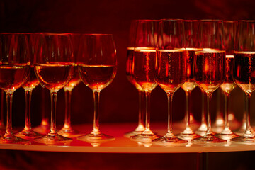 beautiful glasses of wine at an evening festive event