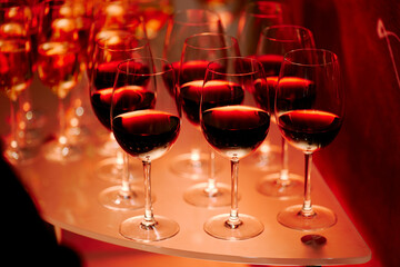 beautiful glasses of wine at an evening festive event