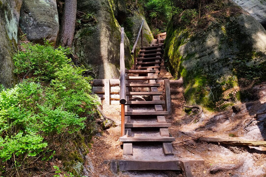 View of a wooden staircase in the mountains. Hiking. © Dzmitry