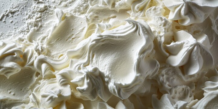 A detailed close-up shot of a cake with white frosting. This image can be used for bakery advertisements or to showcase delicious desserts