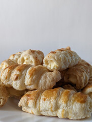 Vanilla rolls on the table with white background 