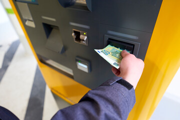 Pay at the machine. Fees are expensive in the parking garage.