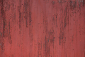 dunkler Hintergrund, sehr altes, rot gestrichenes vintage Holz Wand Textur