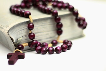 praying to God with the bible and cross in church with no people stock image stock photo