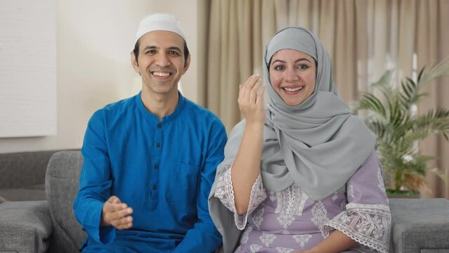 Happy Muslim couple doing Adaab