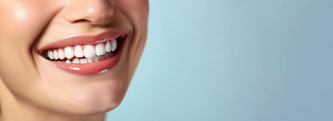Close up shot of a woman's smile with white healthy teeth isolated on a light background. Banner for dentistry