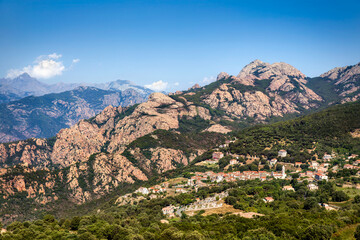 View of the Beautiful Village of Piana on Corsica, France, with the Mountainous Surroundings